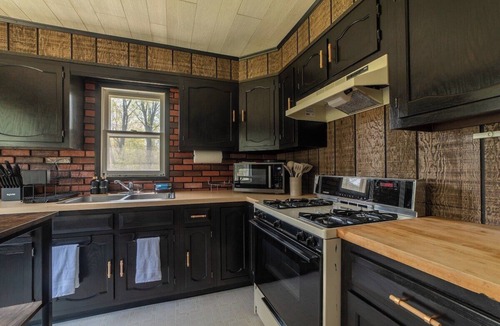 Cheboygan Cabin | Private 1 Acre Creekside Retreat , Game Room , Fire Pit , Kayaks