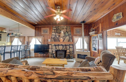 Carp Lake Cottage | Private Dock & Views! Family Home on Paradise Lake