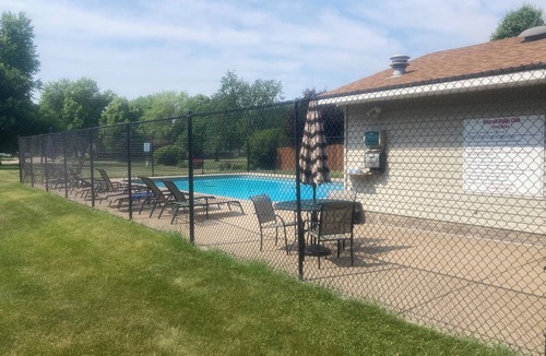 Bettendorf Condo | Quiet & Cozy Pet-Friendly Condo with Pool & Garage