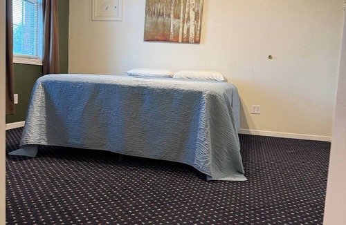 Spillville Apartment | Room 6: Sleep Where Prohibition Secrets Were Made - Historic Escape!
