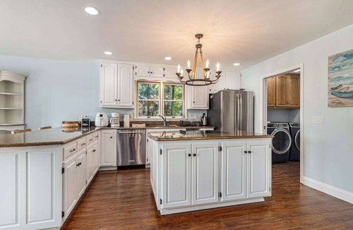 Berrien Springs House | Serene lakefront retreat with an expansive deck, dock access, game room, & AC
