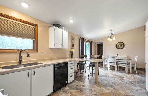 Little Suamico House | Serene Riverside Retreat with Air Hockey and Pool Table in Little Suamico, Wisconsin
