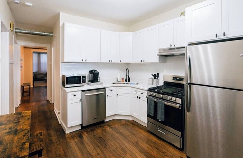 Logan Square Apartment | Spacious 3-bedroom retreat in West Logan with modern amenities, perfect for families looking to relax and explore vibrant Logan Square.