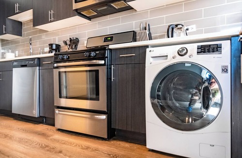 Near South Side Hotel | Spacious 3BR Suite with Skyline Views Near McCormick