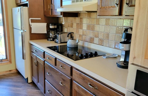 Mancelona Condo | Spacious 5 beds,2 full baths Golf, ski, Sleeps 7, KING bed, Wi-Fi close to Lakes
