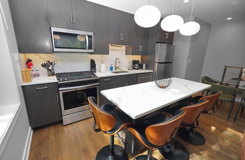 University Village / Little Italy Hotel | Stylish 5BR West Loop Retreat with Optional Parking