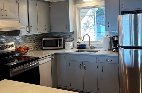 Grand Haven Cottage | Summer Breeze-Lake Michigan Views + Hot Tub ~ Steps to Beach Access