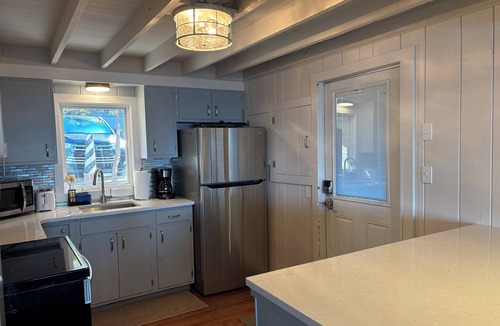 Grand Haven Cottage | Summer Breeze-Lake Michigan Views + Hot Tub ~ Steps to Beach Access