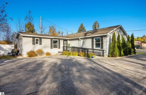 Elk Rapids Apartment | The Coastal Hideaway on Ames. Walk to Beach & Downtown.