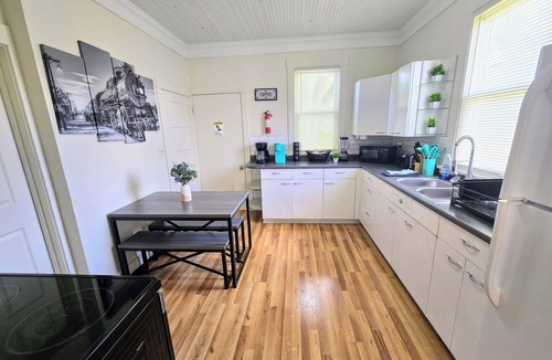Galesburg House | Two-tone Train Home! King bed, Pet friendly, Foosball!