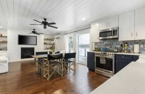 Mancelona Cottage | Updated Cabin with Fireplace, Epic Deck, 2 min from ORV trails - Pet Friendly!