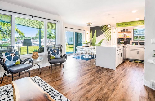 Douglas Condo | Water-view condo with private furnished patio, electric fireplace, W/D, and AC