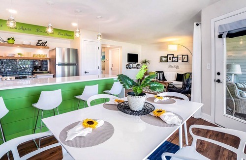 Douglas Condo | Water-view condo with private furnished patio, electric fireplace, W/D, and AC