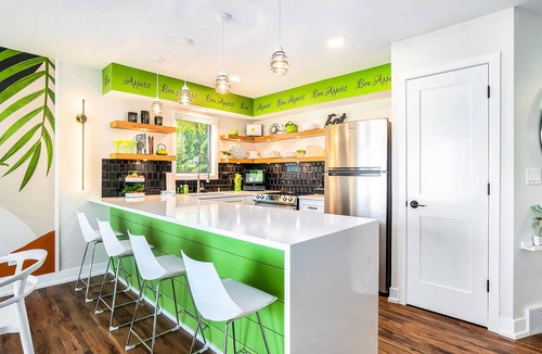 Douglas Condo | Water-view condo with private furnished patio, electric fireplace, W/D, and AC