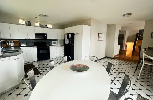 Traverse City House | Waterfront Bass Lake in TC, Game room, A/C, firepit, Dock, Canoe Dog ok.