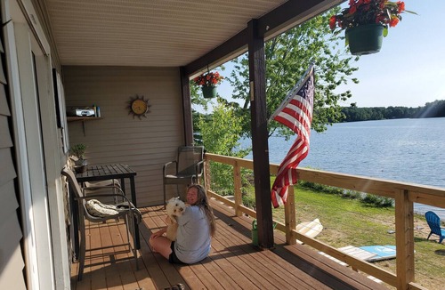Traverse City House | Waterfront Bass Lake in TC, Game room, A/C, firepit, Dock, Canoe Dog ok.