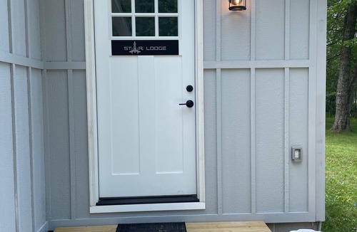 Scottville House | Waterfront home with Star Wars themed bunk room on all sports lake.