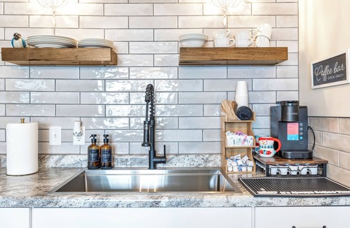 Algoma Apartment | Welcome to The Steele Magnolia! Completely renovated 2 bed/1ba which includes 1 queen and 1 twin XL bunk bed. We are located directly across the street from Von Stiehl Winery and are just a few minutes walk to Crescent Beach!