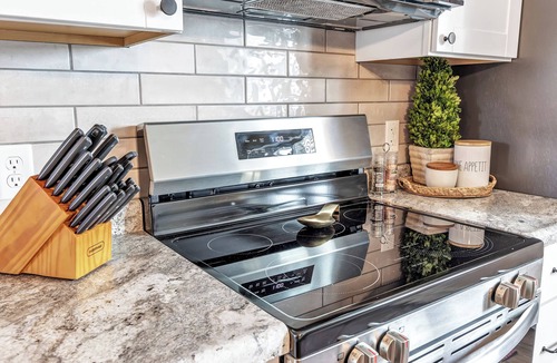 Algoma Apartment | Welcome to The Steele Magnolia! Completely renovated 2 bed/1ba which includes 1 queen and 1 twin XL bunk bed. We are located directly across the street from Von Stiehl Winery and are just a few minutes walk to Crescent Beach!