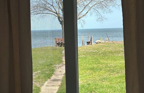 Tawas City Cottage | Welcoming Lake Huron Cowboy Cottage with AC, kayaks, & more in Tawas