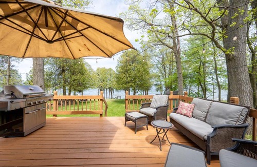 Little Sturgeon House | Yorita Manor- Lakefront Escape, Fire Pit, Pets & Scenic Views