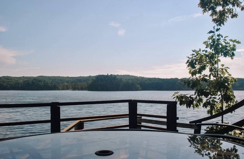 Newaygo House | Your lakeside story, powered by paddles and perfect moments.
