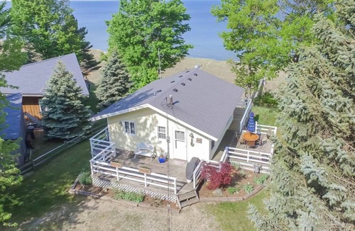 Port Sheldon Cottage | Your private beach. The week sells fast so book your Lake Michigan get away now!