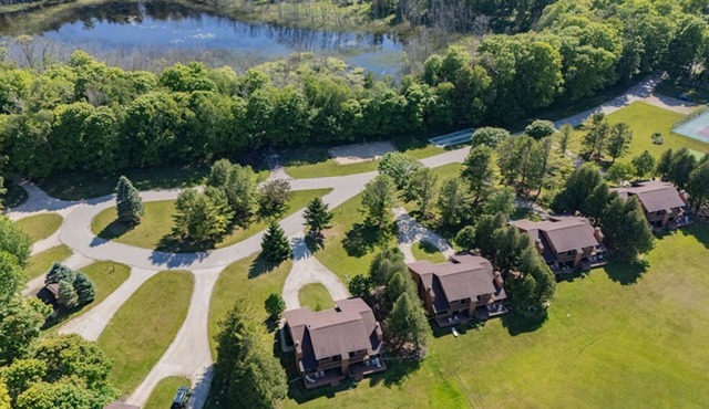 2BR Condo with Fireplace, Balcony, & Lakefront Access at The Rushes