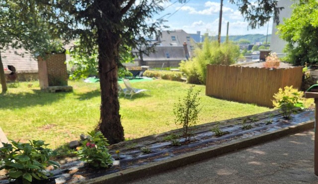 A charming house with a large garden, 3 bedrooms, and an unobstructed view.