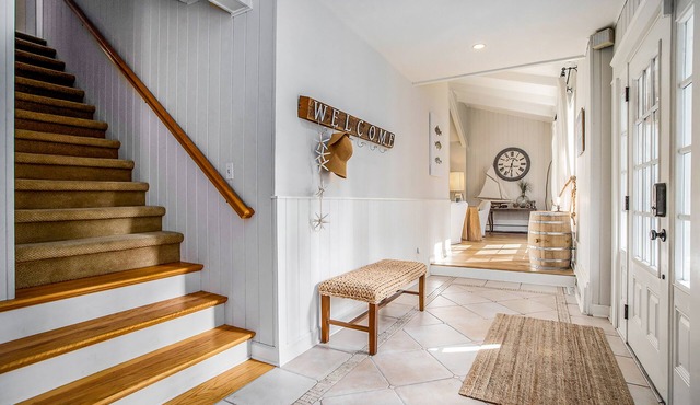 Enchanting home with game room, beach access, firepit, fast WiFi & washer/dryer