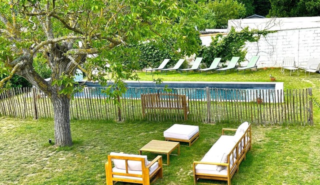 Family home in the heart of the village with a heated pool! Sleeps 13
