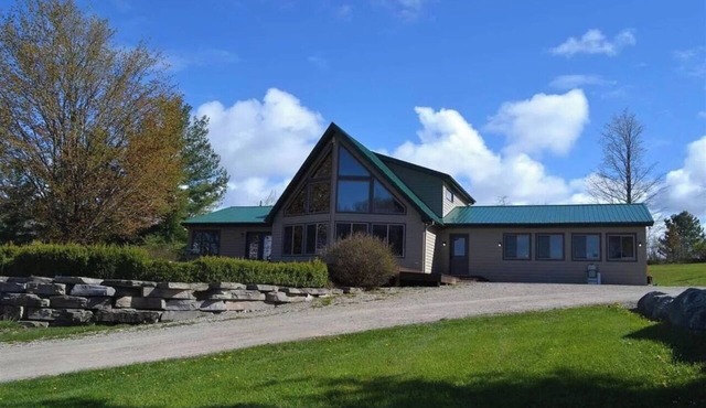 Lake Charlevoix View- 10 Acre Private Retreat, Sleep from 2- 8 persons.