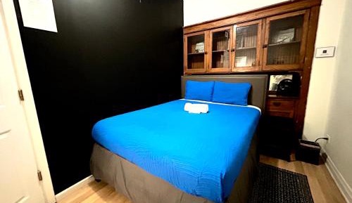 Queen Room with Shared Bathroom