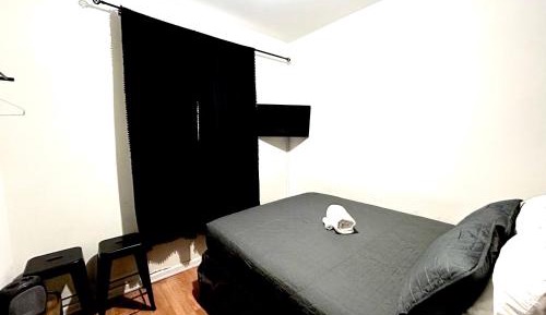 Queen Room with Shared Bathroom