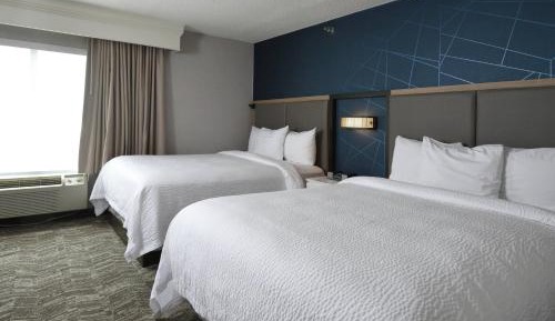 Queen Suite with Two Queen Beds and Sofa Bed
