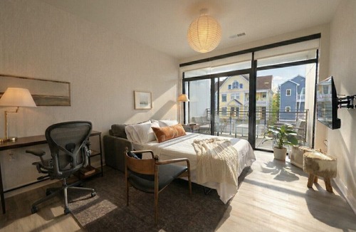 Lower East Side Apartment | East Side Luxury 1BR Apt - Near Brady St with Balcony and Lounge | Sleeps 4