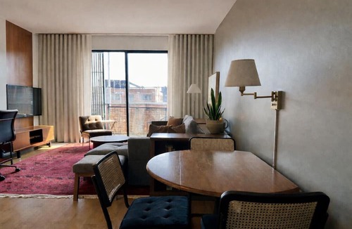 Fifth Ward Apartment | Walker`s Point Designer 2BR · Prime Location with Balcony and Gym · Sleeps 6