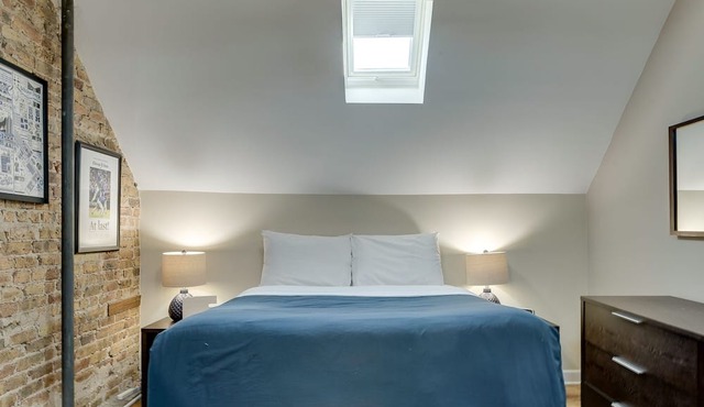 Bright & Lofty Bucktown 1BR by AllSet Turnover
