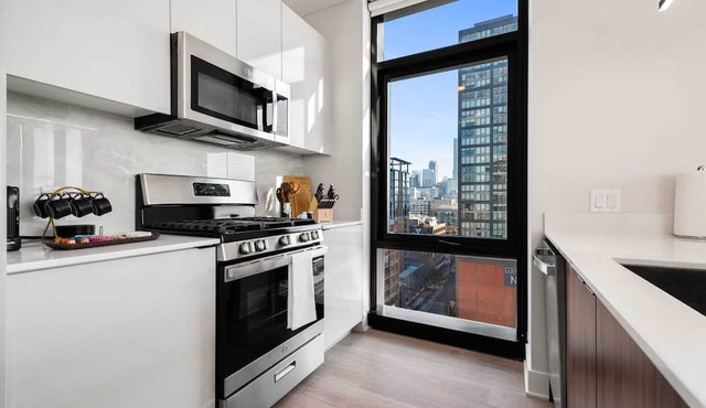 West Loop Scenic Views + Private Balcony Retreat